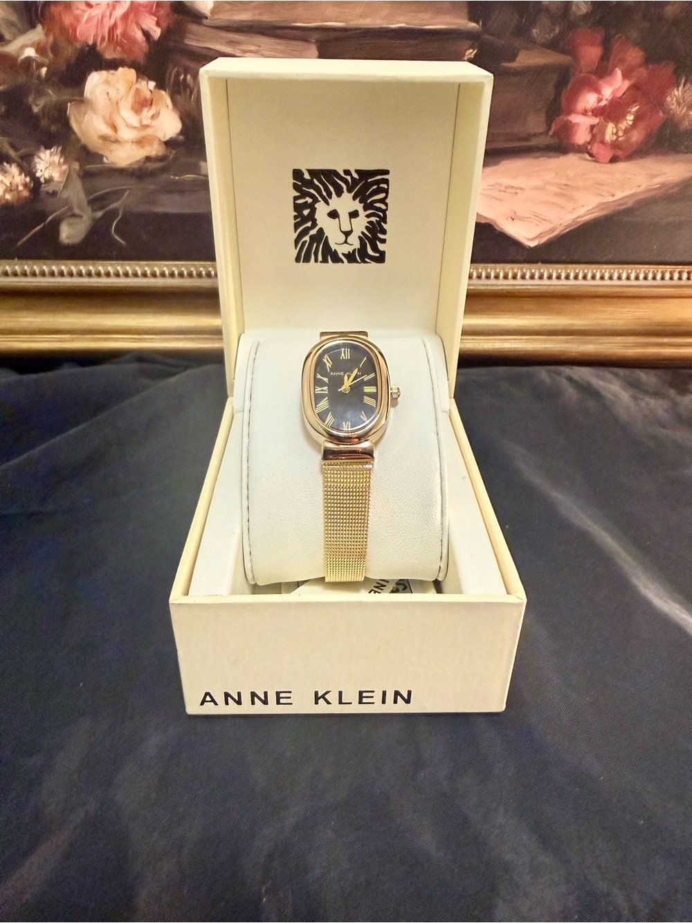 Anne Klein Gold Mesh Bracelet Watch with Black Dial and Oval Case